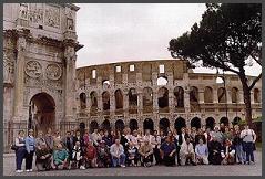 Globus tour group in front of Arch of Titus and Colloseum